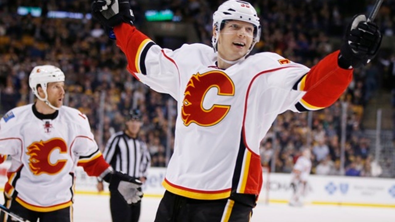 Chad Johnson makes 35 saves, Flames beat Bruins 2-1